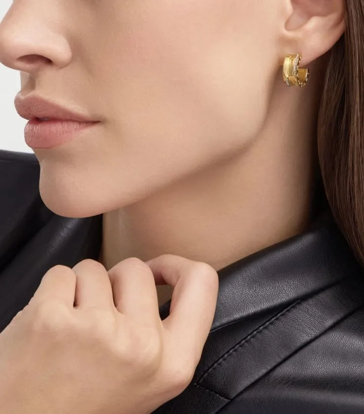 B.zero1 18 kt yellow hoop earrings set with pavé diamonds on the edges